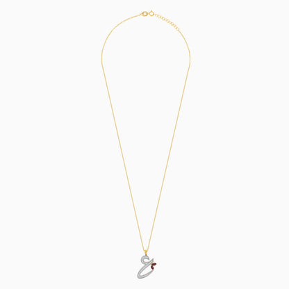 18k yellow gold ‘Ain’ arabic letter necklace decorated With Natural Diamond and garnet stones