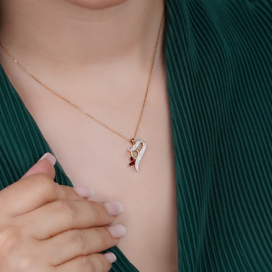 18k Yellow Gold ‘Haa’ Arabic Letter Necklace with Diamonds & Garnet | Horoufi Diamond Collection