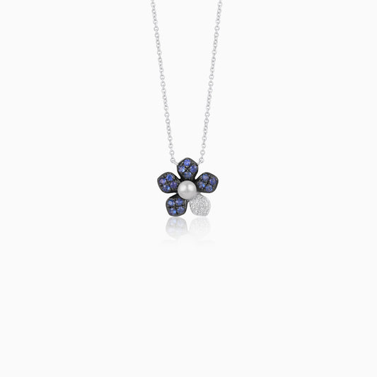 18k white gold chain with a flower shape pendant decorated with natural diamond, sapphire stones and single pearl in the center