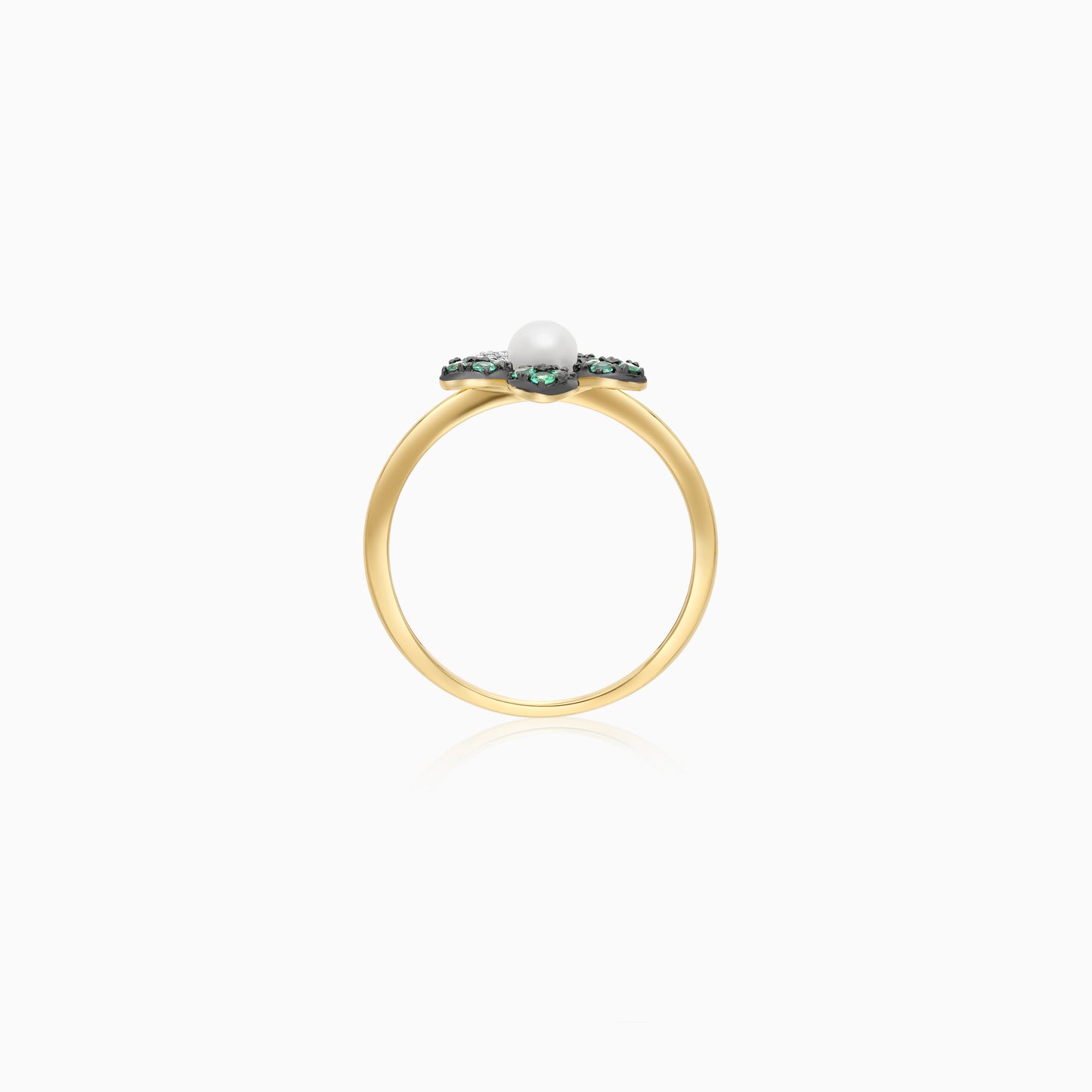18k yellow gold ring with a flower shape on the top decorated with natural diamonds, emerald stones and a single pearl in the center