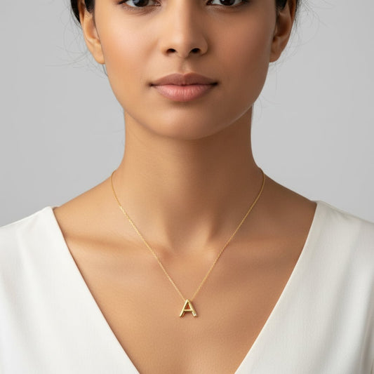 18k yellow gold necklace with letter “A” decorated with single  natural diamond stone from Alpha collection