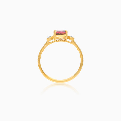 Side view of Filo 18k yellow gold ring with natural diamonds and pink tourmaline gemstone by Jawhara Jewellery
