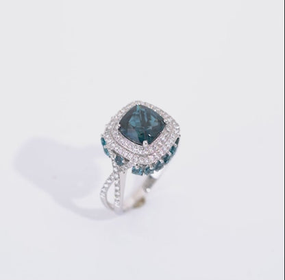 18K White Gold Ring featuring a stunning Natural Diamond and London Blue Topaz stones