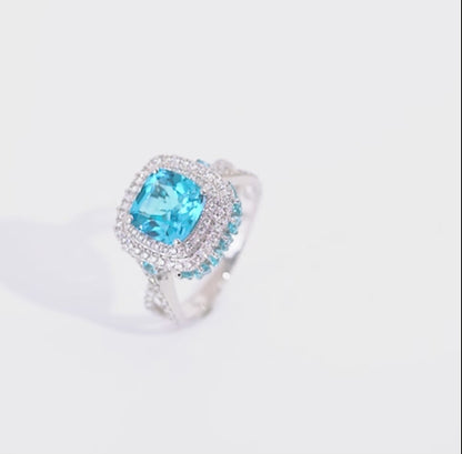 18K White Gold Ring featuring a stunning Natural Diamond and Blue Topaz stones