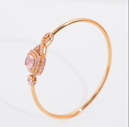 18K Rose Gold Bangle featuring a stunning Natural Diamond and Rose quartz stones