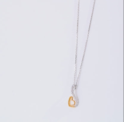 18K Yellow and White Gold Heart-Shaped Necklace Adorned with Natural Diamonds – Dunyati Collection
