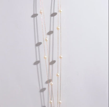 18K YELLOW GOLD LONG NECKLACE DECORATED WITH PEARLS AND ZIRCON STONES